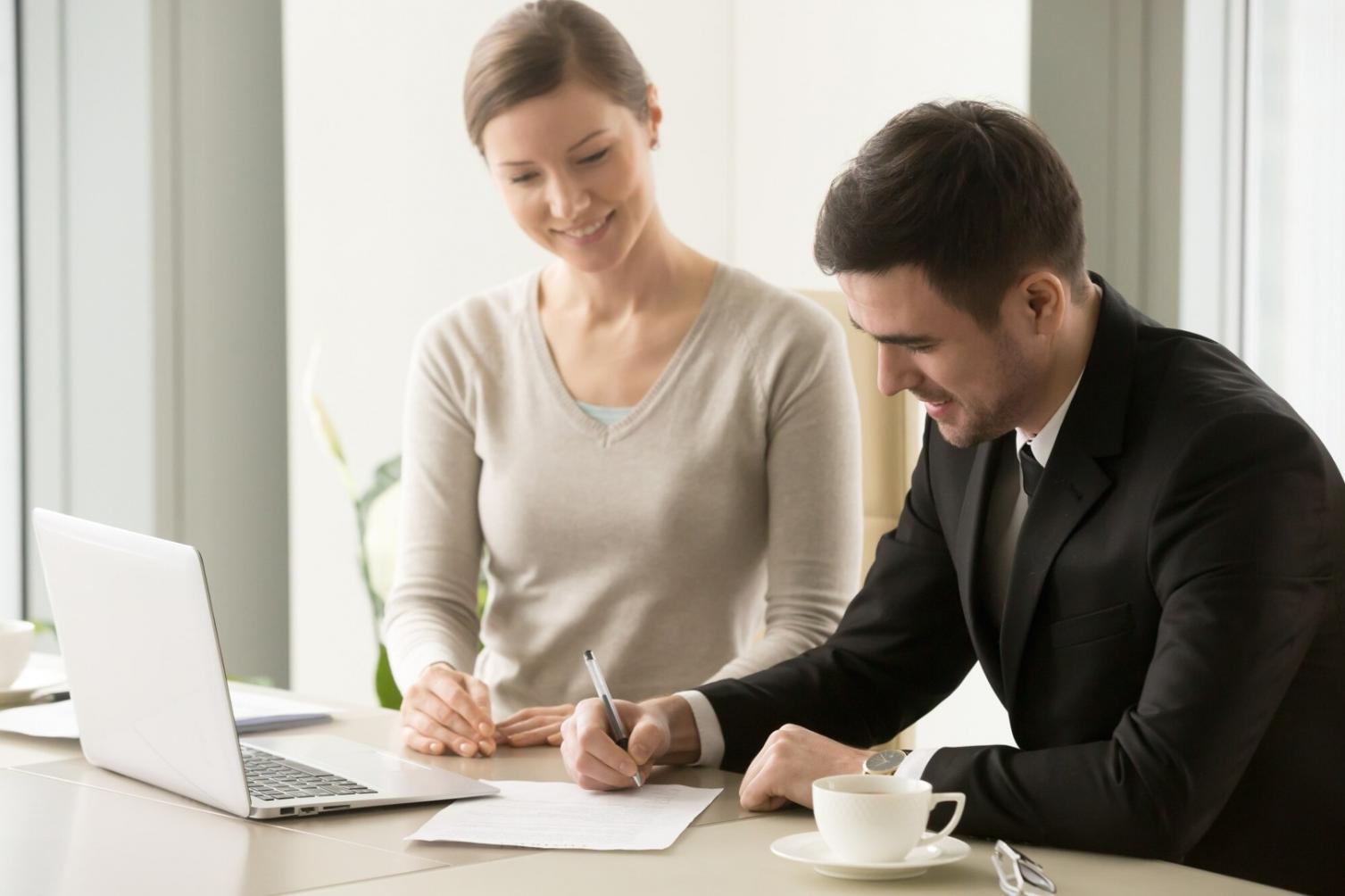 Financial planning session with charts and calculators on desk